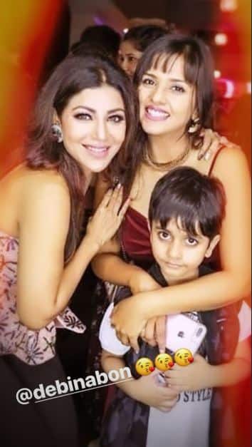 Tv actress Dalljiet Kaur posing with the birthday girl, she attended the party with her little son Jydon