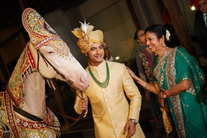 Sharad with his mommy dearest who looked super happy at her son's wedding 