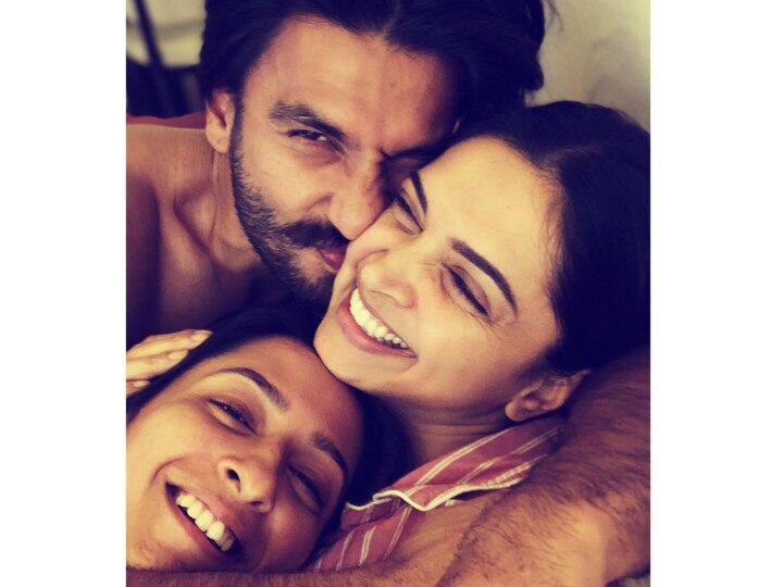 Deepika Padukone gets cuddles and snuggles from hubby Ranveer Singh, sister Anisha Padukone in new pic! Deepika Padukone gets cuddles and snuggles from hubby Ranveer Singh, sister Anisha in new pic!