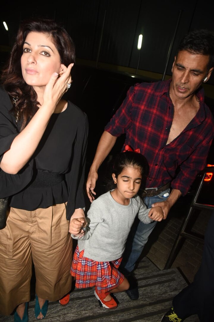 While we have often seen Akshay and Twinkle together, we don’t get to see their lovely daughter Nitara much. The doting parents can be seen clenching her fingers in the photo.
