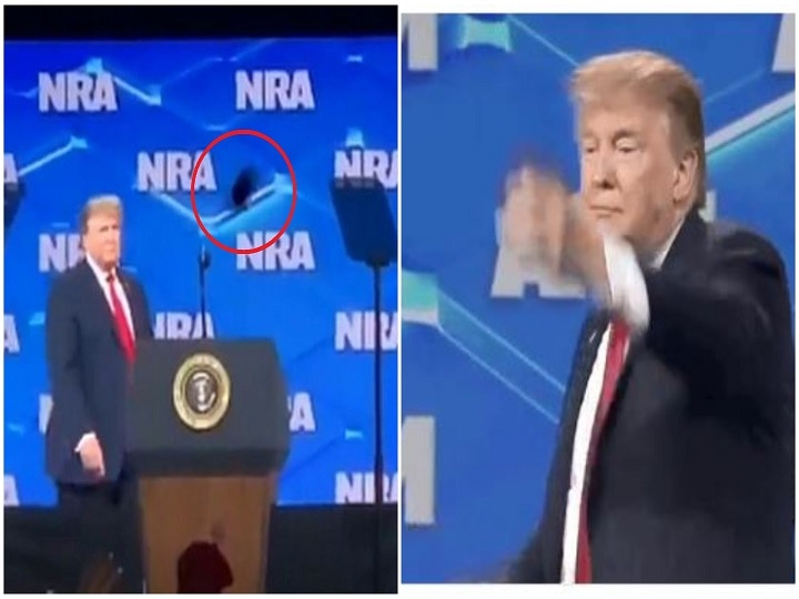 WATCH VIDEO- Phone thrown at US president Donald Trump during speech, he later throws pen on crowd WATCH VIDEO: Phone hurled at Donald Trump during speech, he later throws pen on crowd