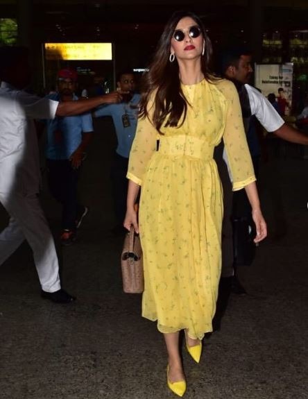 PICS& VIDEO: Is Sonam Kapoor pregnant? Her loose dress & 'awkward' walk at airport makes fans believe so!
