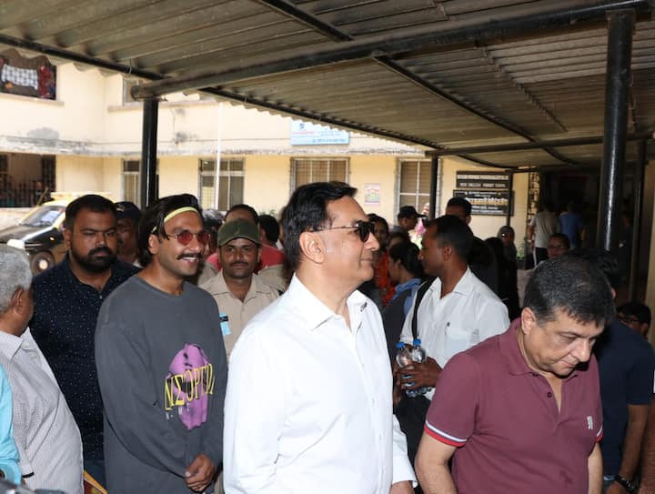 Ranveer Singh & father Jagjit Singh Bhavnani patiently waiting in a queue to vote at a booth in Mumbai. (Photo: Manav Manglani)