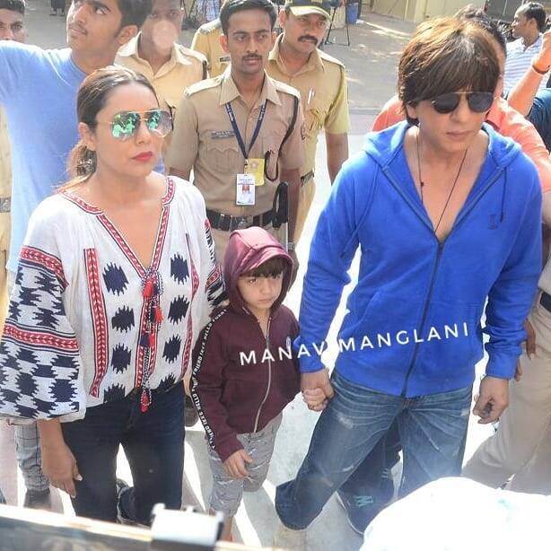 SRK arrives with wife Gauri and son Abram to cast his vote