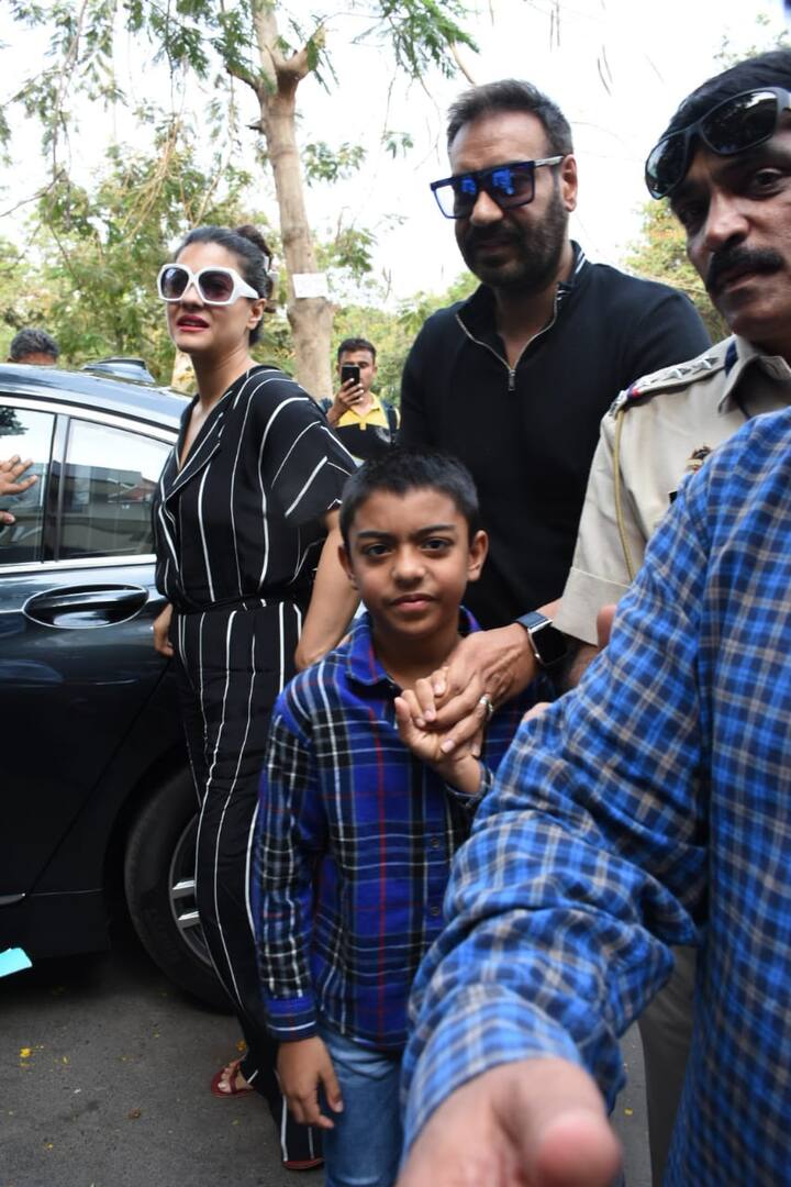 Bollywood couple Ajay Devgn and Kajol arrived together with their son Yug. (Photo: Manav Manglani)
