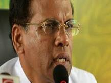 Sri Lankan president suspends defiant police chief over serial blasts