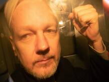 WikiLeaks founder Julian Assange sentenced to 50 weeks in prison for bail breach