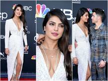 Billboard Music Awards 2019: Priyanka Chopra sets RED CARPET on fire in a sparkly white gown with a plunging neckline & thigh-high slit!