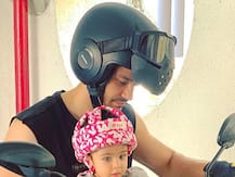 Soha Ali Khan-Kunal\'s daughter Inaaya Naumi Kemmu turns \'biker baby\' looking super cute in a helmet posing with dad!
