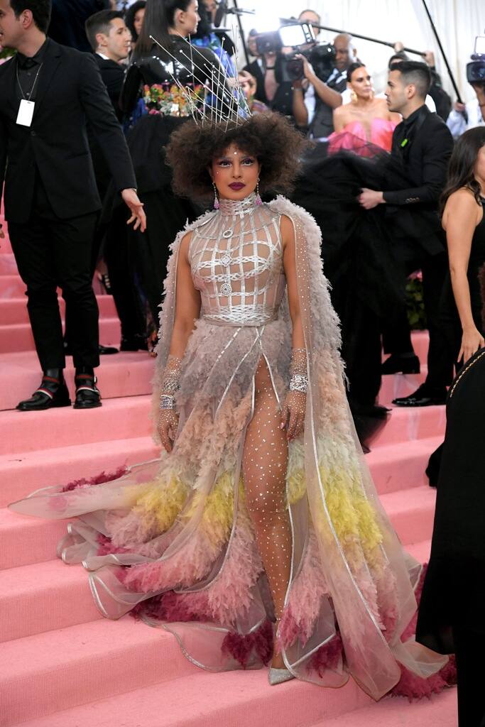 Bollywood diva Priyanka Chopra turned up at the Met Gala 2019 on Monday night in style. The global actress looked sensational in her Dior Haute Couture silver gown with colourful and vibrant feathered ruffles coupled with a matching cape.