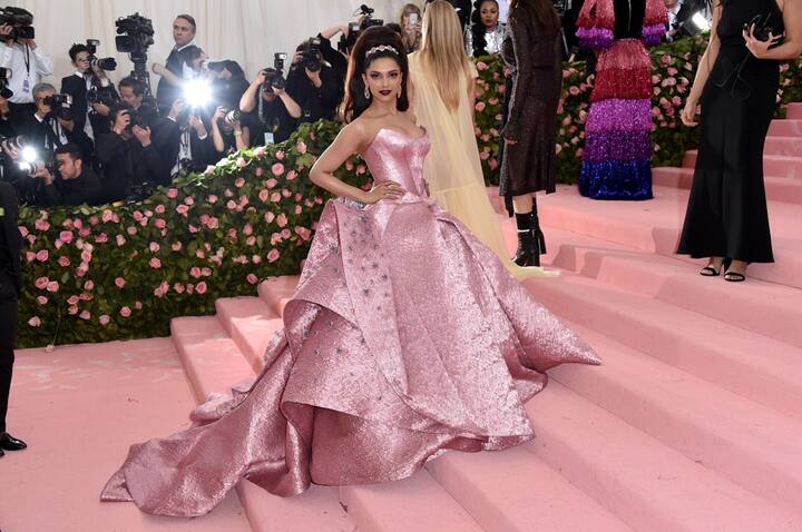 While other celebs opted more of a dramatic look, the Bollywood queen kept it simple yet stylish in her pink gown[Pic credit: Getty] 