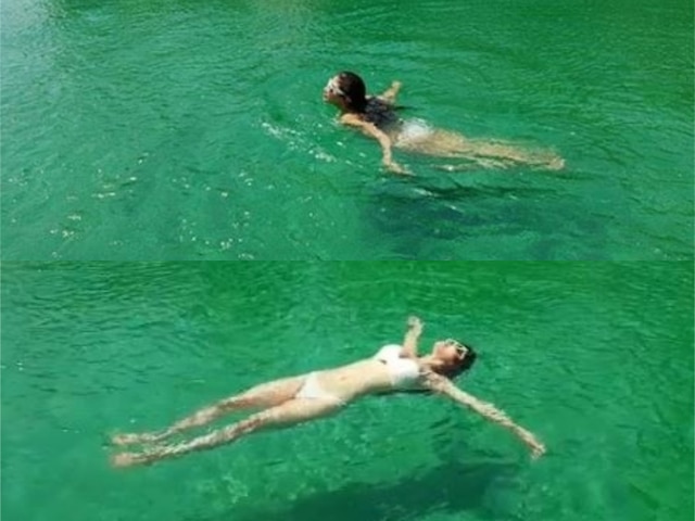 PICS & VIDEO: Mouni Roy looks stunning in a white two piece bikini as she beats the summer heat chilling in pool! Naagin Mouni Roy looks stunning in a two piece bikini as she beats the summer heat chilling in pool!