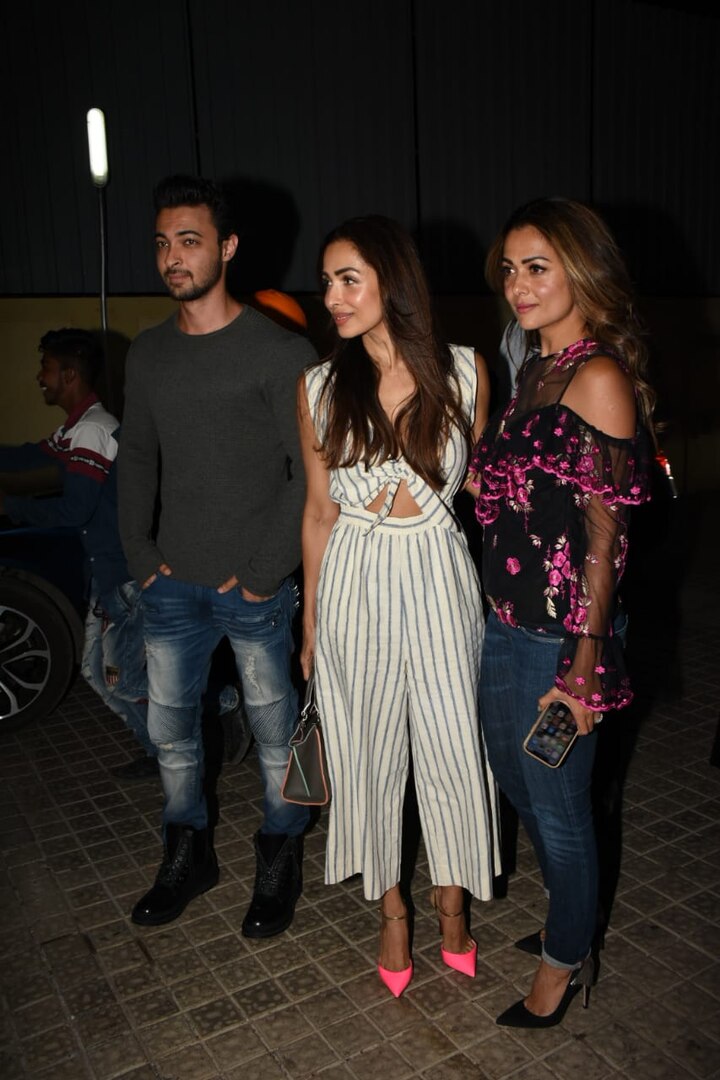 Sisters Malaik & Amrita Arora posing with Aasyush Sharma at 'SOTY 2' screening. (Photo: Manav Manglani)
