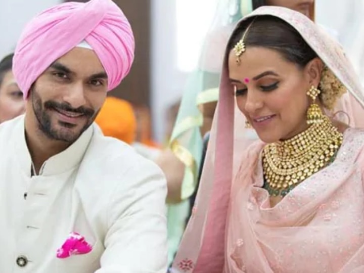 Neha Dhupia & Angad Bedi celebrate their first marriage anniversary, Couple shares VIDEOS Neha Dhupia & Angad Bedi celebrate first anniversary; share UNSEEN video from their wedding