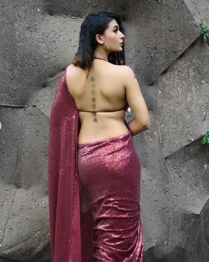 OH LA LA! Naagin 3 actress sets internet on fire with latest pics flaunting her 7 chakra tattoo!