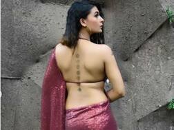 OH LA LA! Naagin 3 actress sets internet on fire with latest pics flaunting her 7 chakra tattoo!