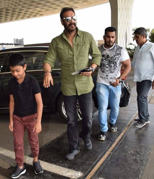 Bollywood actor Ajay Devgn and son Yug Devgn were on Tuesday clicked at the Mumbai airport.
