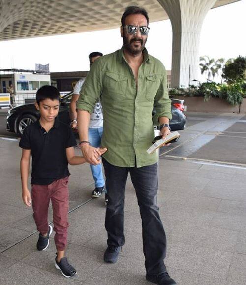 Bollywood actor Ajay Devgn and son Yug Devgn were on Tuesday clicked at the Mumbai airport.