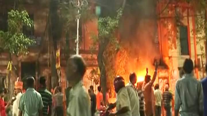It is reported that stones were pelted at Amit Shah's convoy from a college hostel on Bidhan Sarani. BJP supporters gherao the building and return the attack.