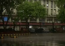 IN PICS: Heavy showers bring respite to residents from scorching heat in Delhi-NCR
