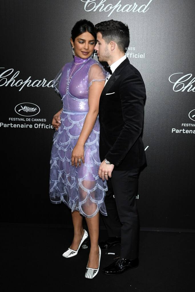 The couple looked smitten in each other's company on the red carpet as they exchanged loving gazes at one another