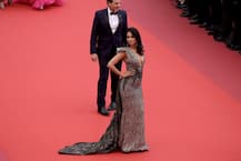 Cannes 2019: Mallika Sherawat oozes OOMPH on the RED CARPET in her gorgeous gown with plunging neckline!
