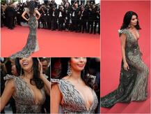 Cannes 2019: Mallika Sherawat oozes OOMPH on the RED CARPET in her gorgeous gown with plunging neckline!