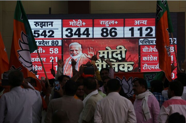 Several supporters were glued to the TV screens at the headquarters in Delhi and they shouted slogans when the trends were in favour of BJP. (Picture credit- AP)