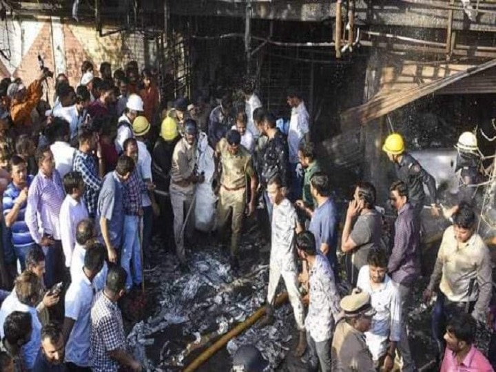 Surat fire tragedy: Death toll reaches 21, Gujarat CM Vijay Rupani orders fire safety audit of schools, malls Surat Fire: 21 dead; Coaching centre illegally constructed, Police files FIR against 3