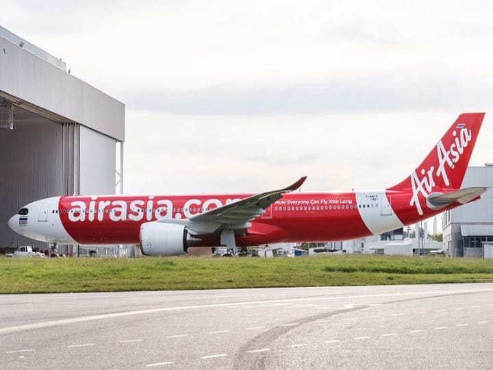 Air Asia flight makes emergency landing after threat call Air Asia flight makes emergency landing after threat call