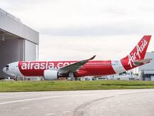 Air Asia flight makes emergency landing after threat call
