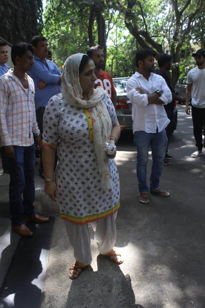 Family and friend at Ajay Devgn's house. Last rites will reportedly take place in the evening.