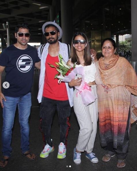 PICS: Hina Khan returns to India with boyfriend Rocky Jaiswal; Receives a surprise welcome from mom & brother!