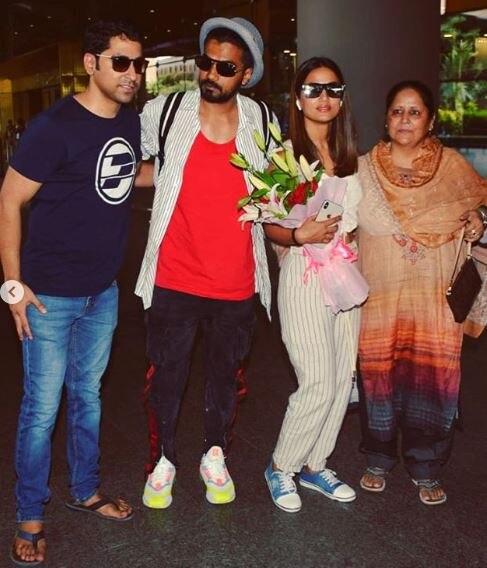 PICS: Hina Khan returns to India with boyfriend Rocky Jaiswal; Receives a surprise welcome from mom & brother!