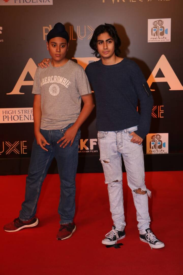 The 16-year-old star was seen dressed in a tee and denims. He was spotted along with a friend at the premiere. (Source- Manav Manglani)