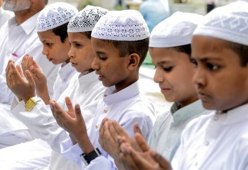The holiday traditionally lasts one to three days and is eagerly anticipated after the month of fasting. During Ramadan, the faithful refrain from eating, drinking, smoking or sexual activity from dawn to dusk./ IMAGE: India (Photo by NARINDER NANU / AFP)