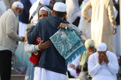 Pakistan, which is mostly Sunni, traditionally celebrates a day after most of the Muslim world. Pakistan is also split within the country along geographical lines, with residents of Khyber Pukhtunkhwa province, located on the border with Afghanistan and dominated by ethnic Pashtuns, celebrating Eid on Tuesday. The new moon was apparently spotted in North Waziristan, while the rest of Pakistan will celebrate on Wednesday.IMAGE: France (Photo by Richard BOUHET / AFP)