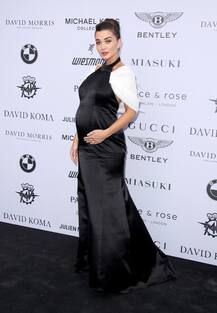 IN PICS:Pregnant Amy Jackson flaunts her baby bump in a satin gown as she attends charity gala!