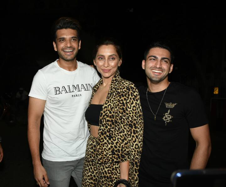 Much-in-love couple Karan Kundrra & Anusha Dandekar posing for the paparazzi at Ekta Kapoor's birthday bash. (Photo: Manav Manglani)