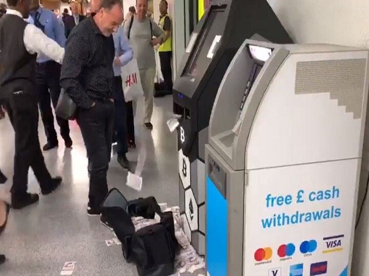 WATCH, Bitcoin ATM starts shooting out notes at busy London station, onlookers surprised Bitcoin ATM starts shooting out notes at busy station; onlookers surprised