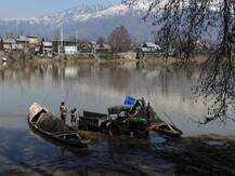 Kashmir: Jhelum river water breaches flood alarm level due to unprecedented snowfall, heavy downpour