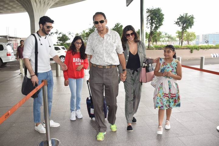 The former beauty queen made a stylish appearance at the Mumbai airport, as she walked hand-in-hand with her dad and was followed close behind by her beau Rohman Shawl and her two girls, Renne and Alisah