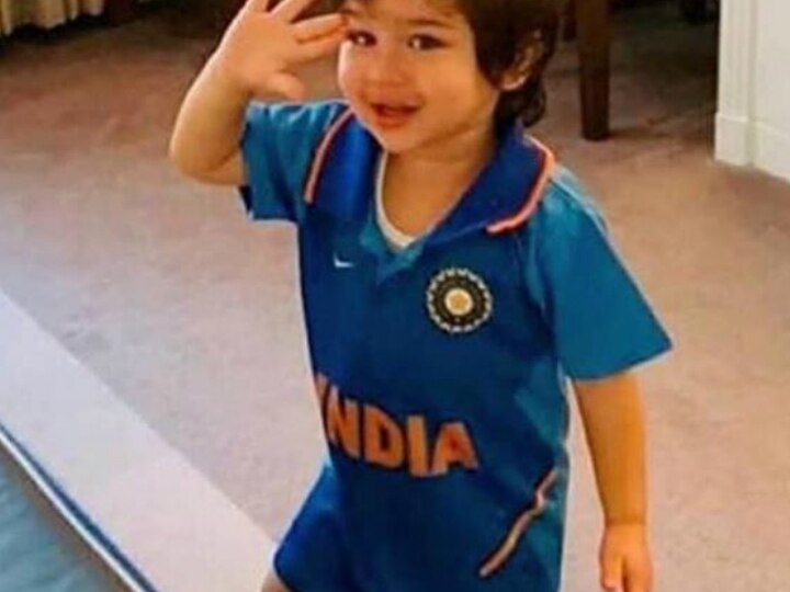 ICC World Cup 2019: Ind Vs Pak: Fans going gaga over Taimur Ali Khan's picture celebrating India's victory over Pakistan wearing team India blue jersey Fans going gaga over Taimur Ali Khan's pic celebrating India's victory over Pakistan wearing team India blue jersey