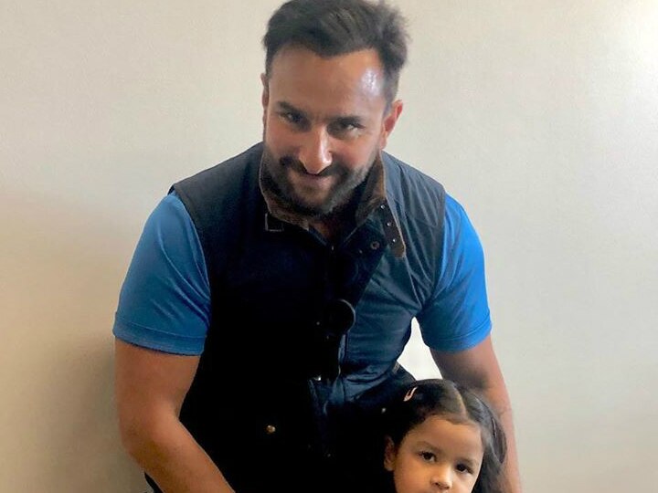 VIRAL pic: Saif Ali Khan posing with M S Dhoni's adorable daughter Ziva Dhoni during Ind Vs Pak match VIRAL pic: Saif Ali Khan posing with M S Dhoni's adorable daughter Ziva Dhoni during Ind Vs Pak match