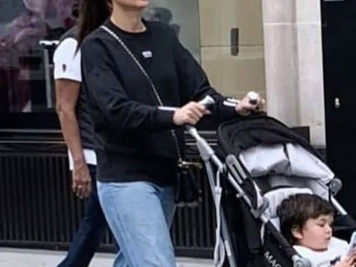 Kareena Kapoor Khan takes Taimur li Khan out for a stroll on London streets, Baby busy on his 'mobile'! New PICS: Kareena Kapoor Khan takes Taimur li Khan out for a stroll on London streets, Baby busy on his 'mobile'!