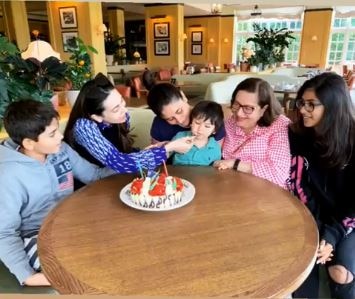 Karisma Kapoor feeds cake to baby Taimur as she celebrates her 45th birthday with family in London!