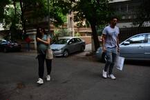 PHOTOS: Arjun Rampal and his heavily pregnant girlfriend Gabriella Demetriades snapped as they take a stroll!
