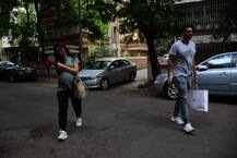 PHOTOS: Arjun Rampal and his heavily pregnant girlfriend Gabriella Demetriades snapped as they take a stroll!
