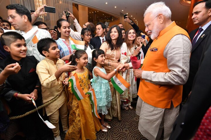 PM Modi being welcomed by Indian Community upon his arrival in Osaka. (Twitter)