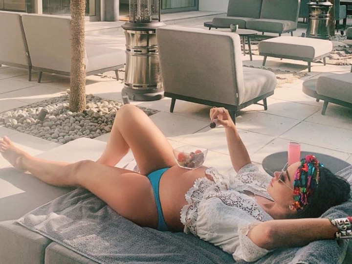 Pregnant Amy Jackson sunbathes in bikini, flaunts her baby bump, see PIC! PIC! Pregnant Amy Jackson Takes Sunbath In A Bikini, Flaunts Her Baby Bump